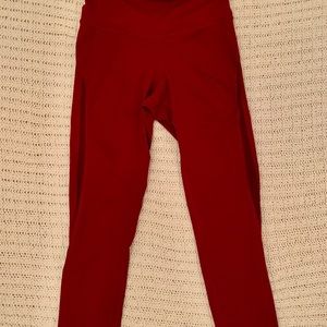 High waisted red leggings with mesh material